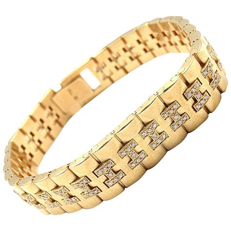 Hermes gold bracelet with diamonds